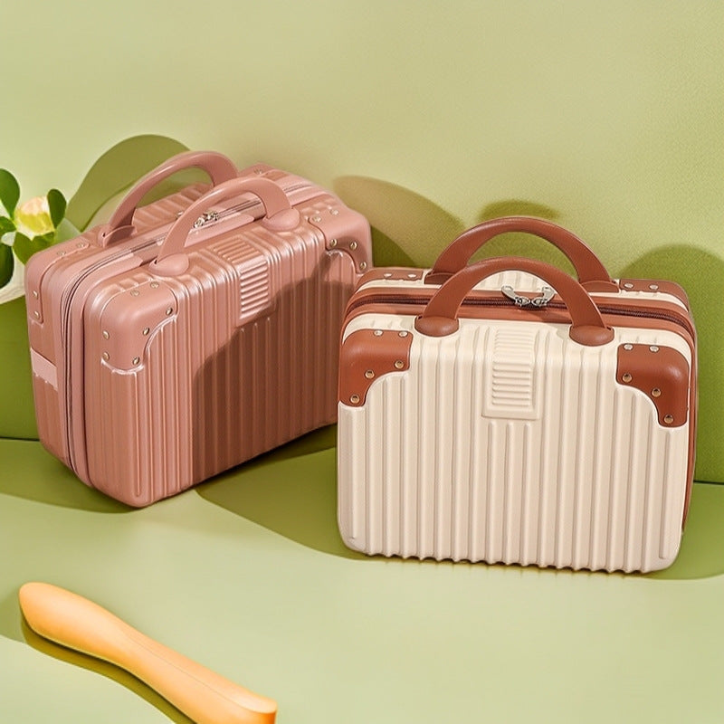 structured hard-shell vanity travel case with faux-leather corner reinforcements and dual top handles Bowlift