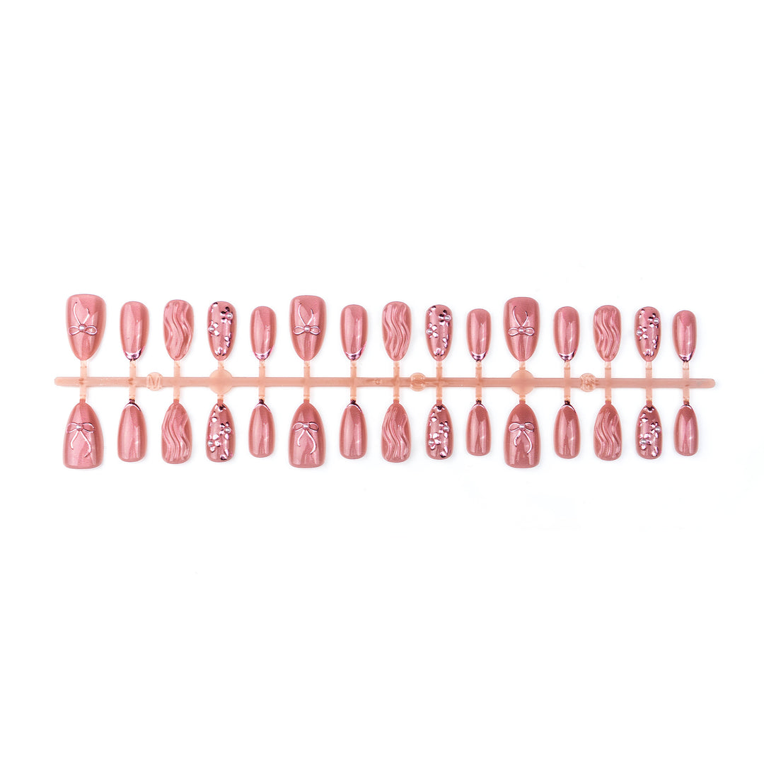 Nail art set with elegant bows and pearl accents Bowlift