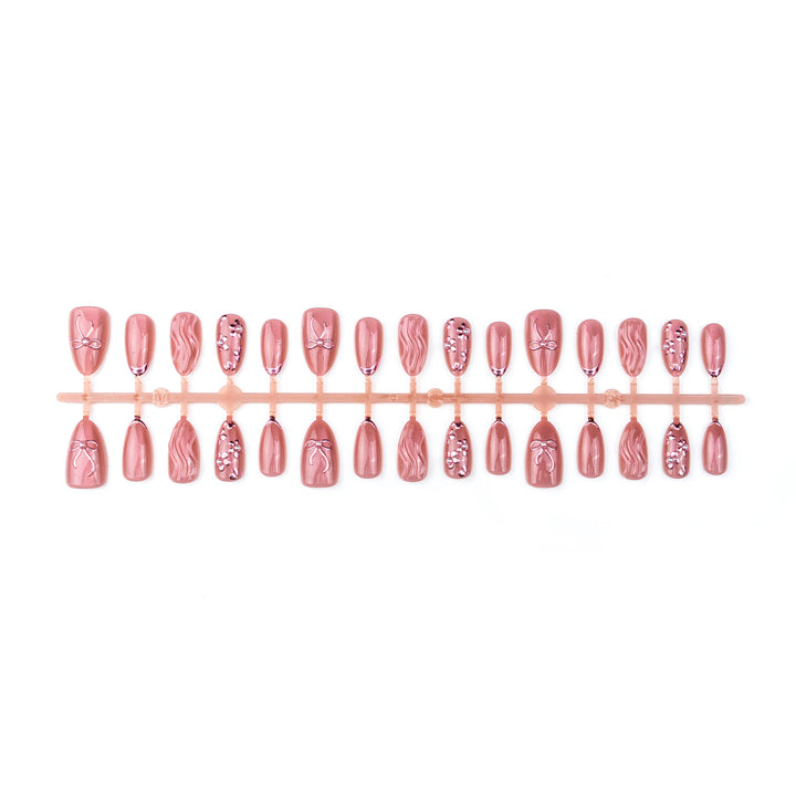 Nail art set with elegant bows and pearl accents Bowlift