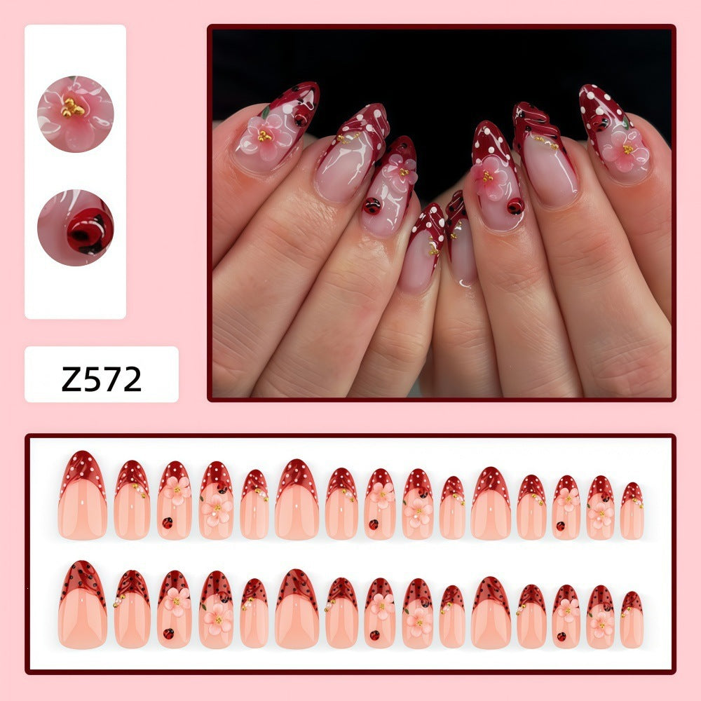Creative tip design artificial nails with floral accents Bowlift