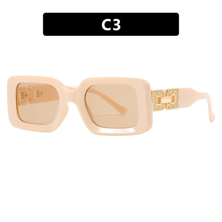 Women’s fashionable sunglasses in elegant square design with luxurious golden accents Bowlift
