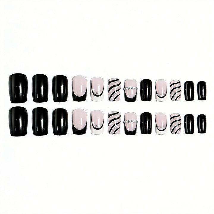 Elegant artificial nails with glitter and stripe accents Bowlift