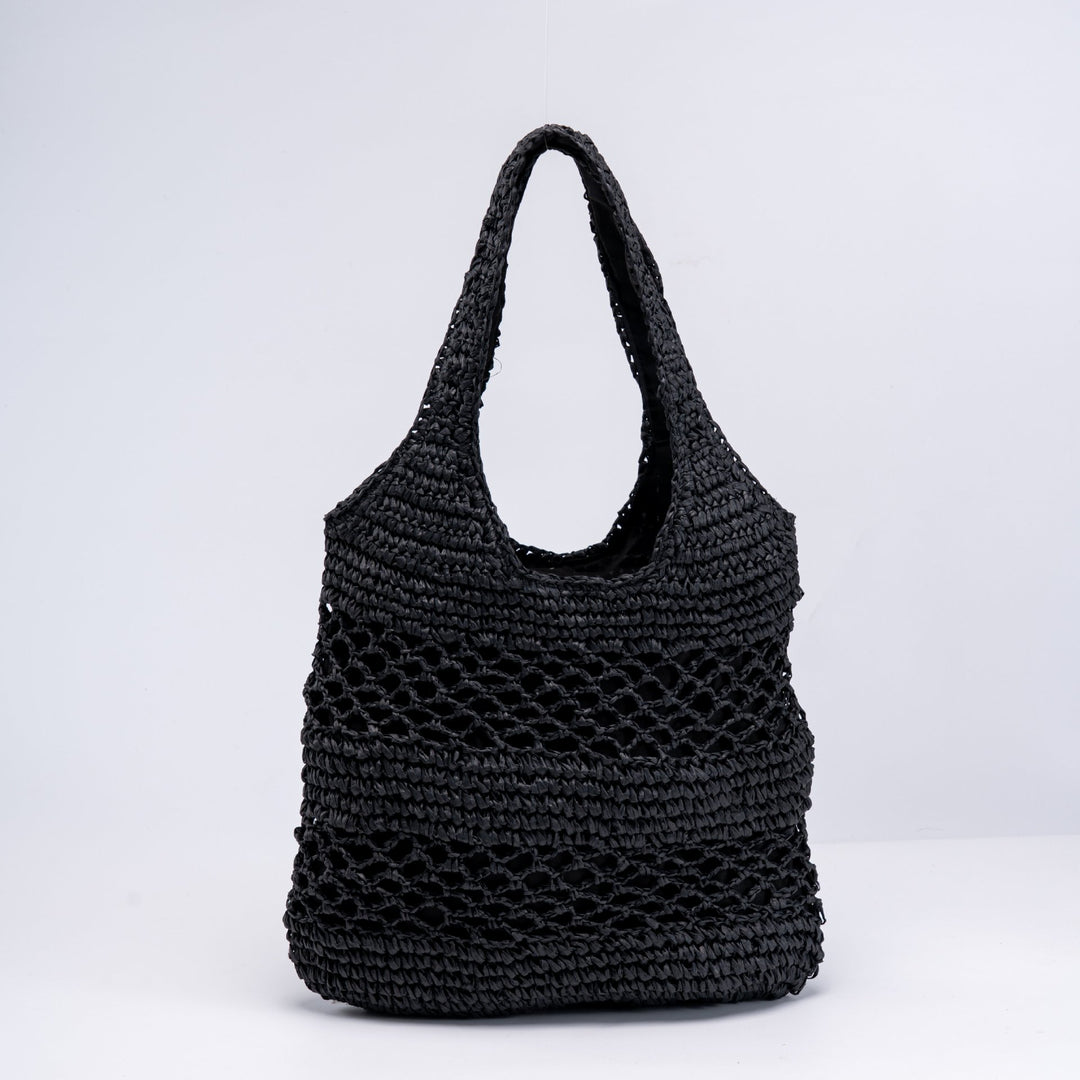 Handwoven beach bag with open mesh structure Bowlift