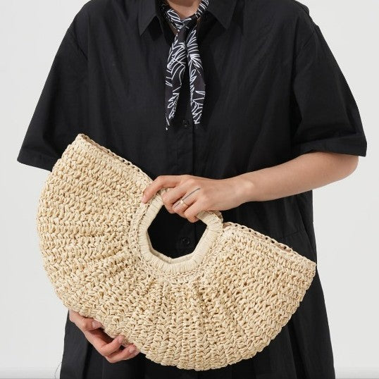 Designer Bast handbag with unique cut Bowlift