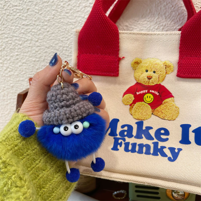 Playful Fuzzy Character Keychain Bowlift