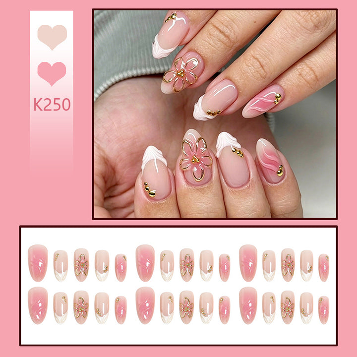 Nail set with elegant floral and glitter elements Bowlift