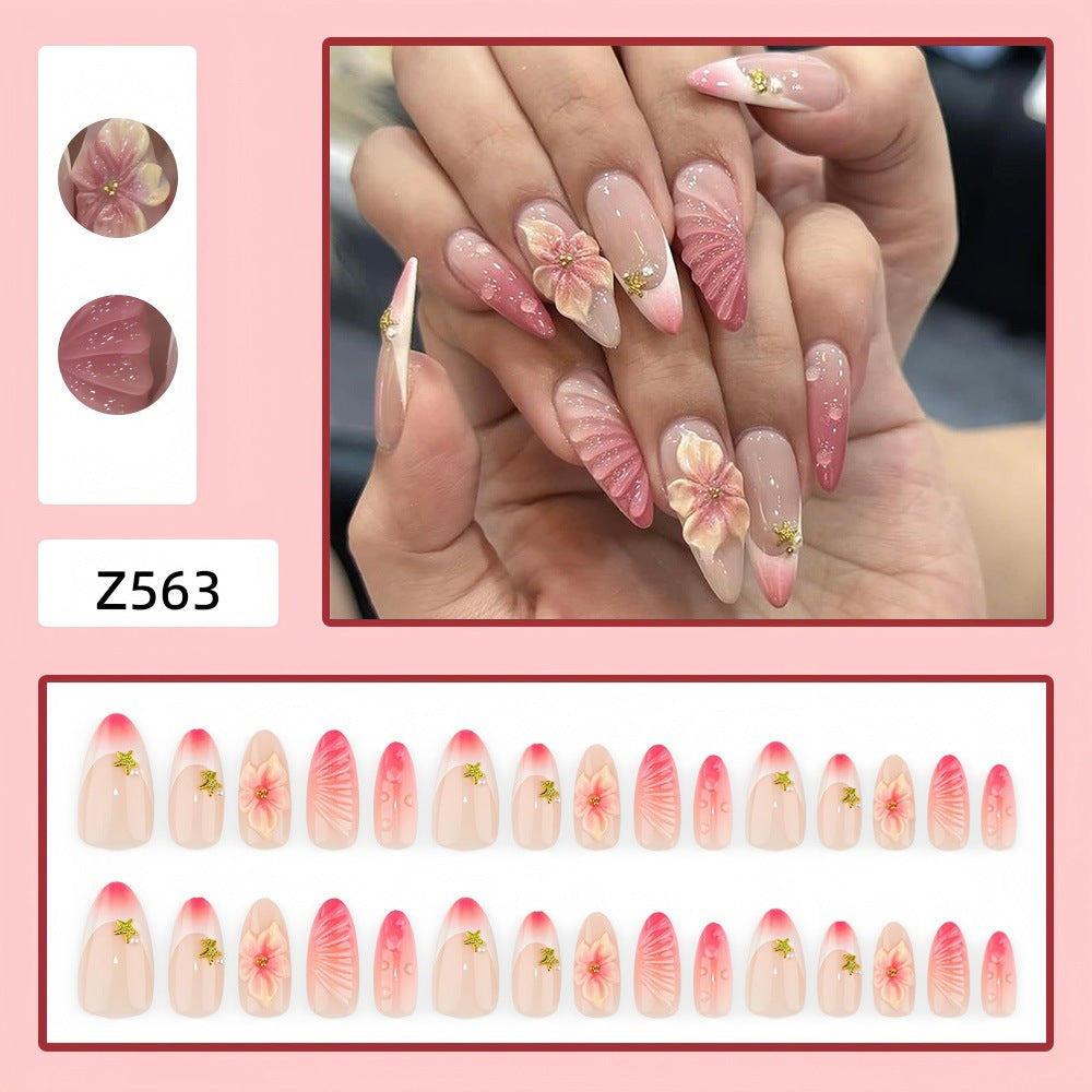 Artificial nails with flower and glitter accents Bowlift
