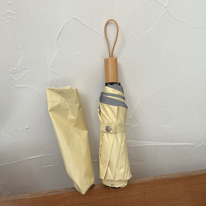 Women's automatic folding umbrella with elegant design and ergonomic wooden handle Bowlift