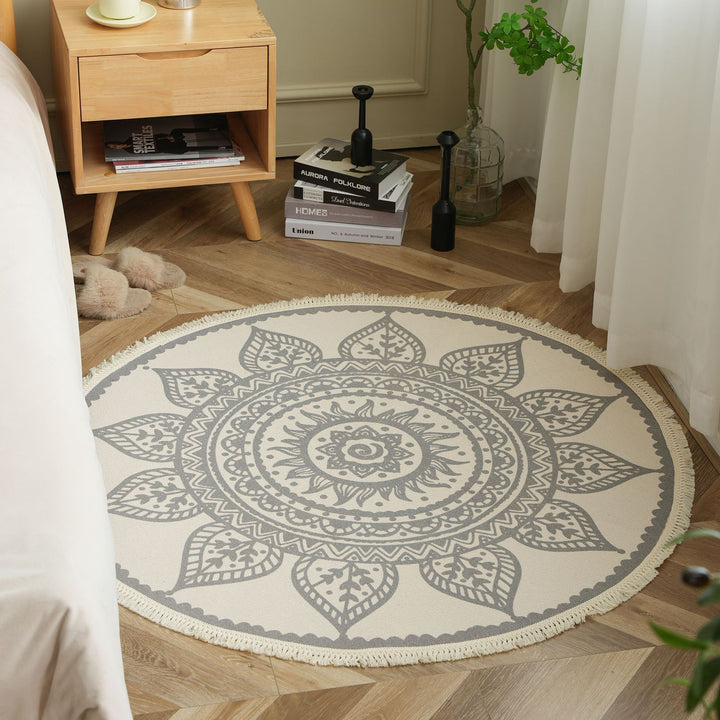 Round woven rug with mandala motif, flat cotton-jute mix and fringes Bowlift