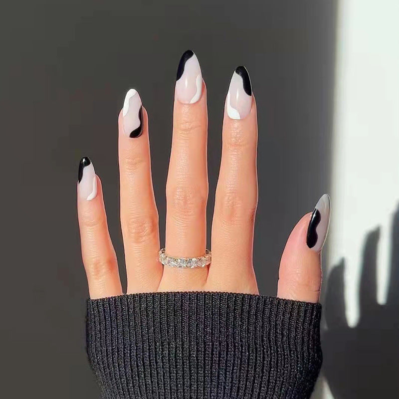 Artful Stiletto Nails with Abstract Color Design Bowlift