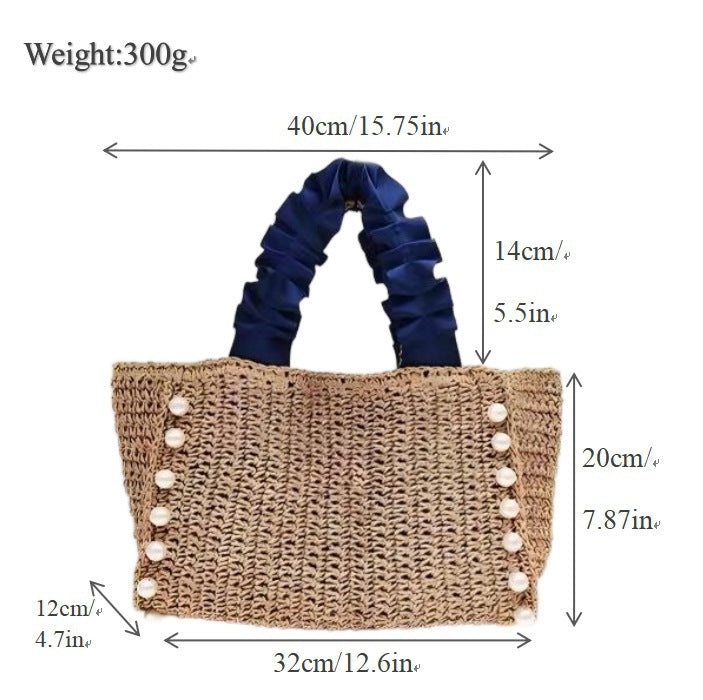 Fashionable straw bag with ruffle detail Bowlift