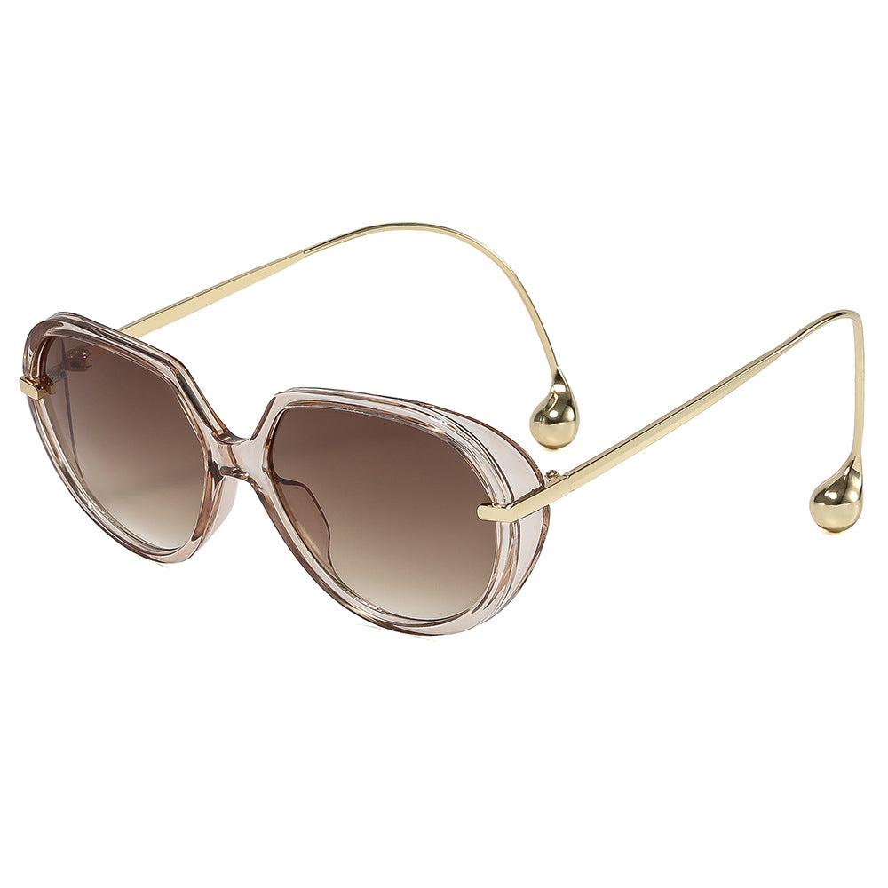 Women's Cat-Eye Sunglasses with Golden Accents and Stylish Frame Bowlift