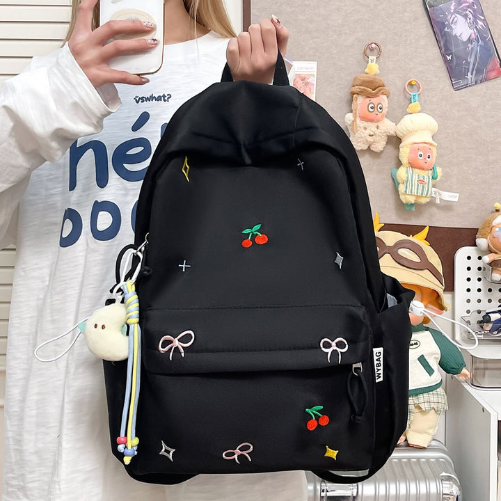 Playful backpack with embroidery Bowlift