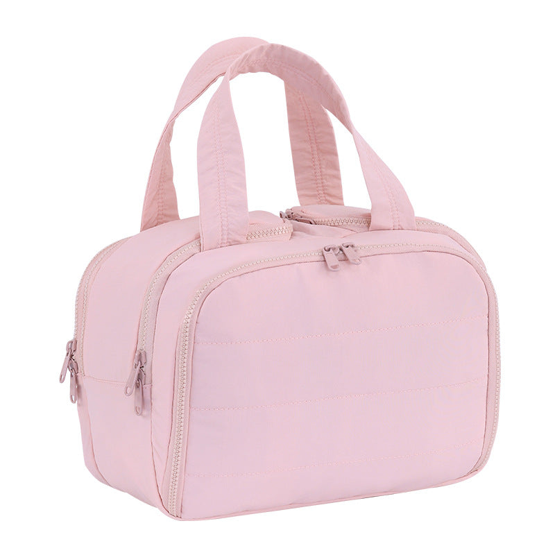 Travel bag with multifunctional compartment Bowlift