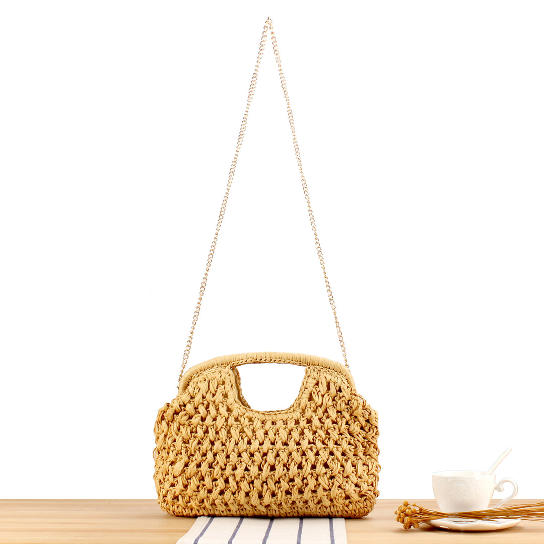 Handbag made of naturally untreated woven material with elegant chain embellishment Bowlift