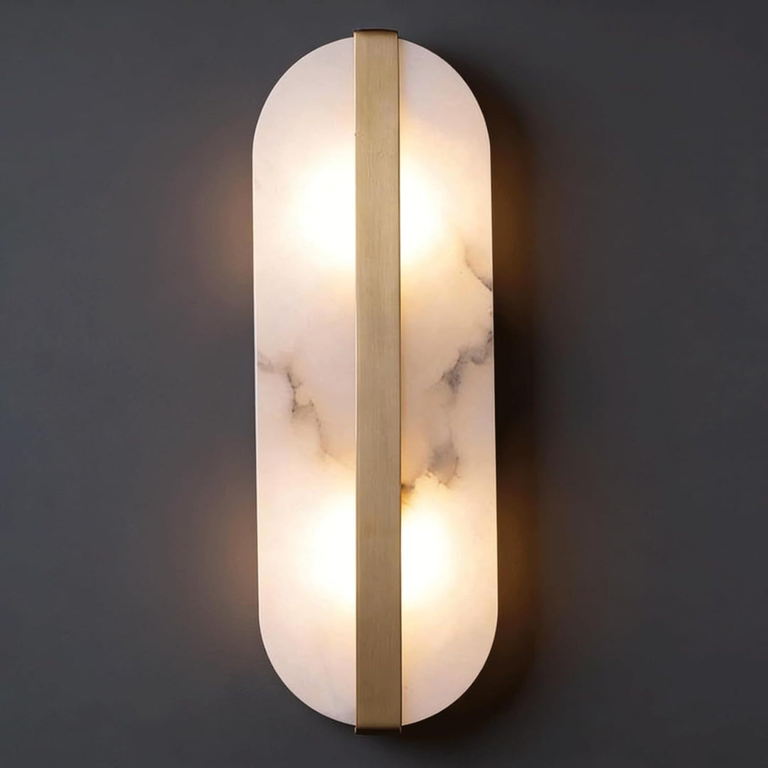 Modern marble oval wall sconce with brass accent and dual pin lamp holders Bowlift