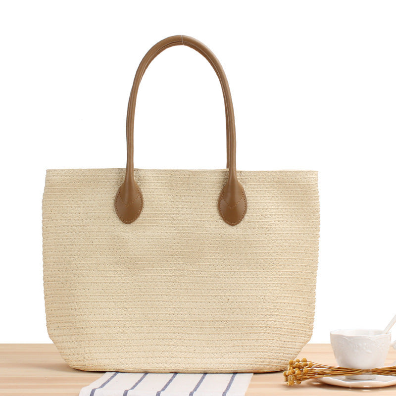 Spacious straw tote bag with elegant leather straps Bowlift