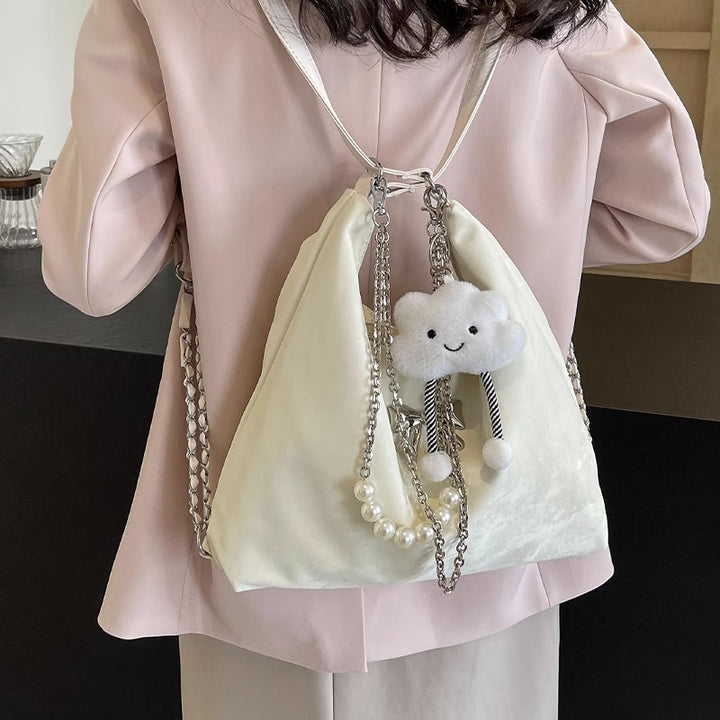 Fashionable handbag with unique pendant and chain accents Bowlift