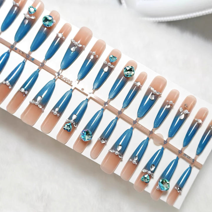 Artificial nails with elegant glitter and stone details Bowlift