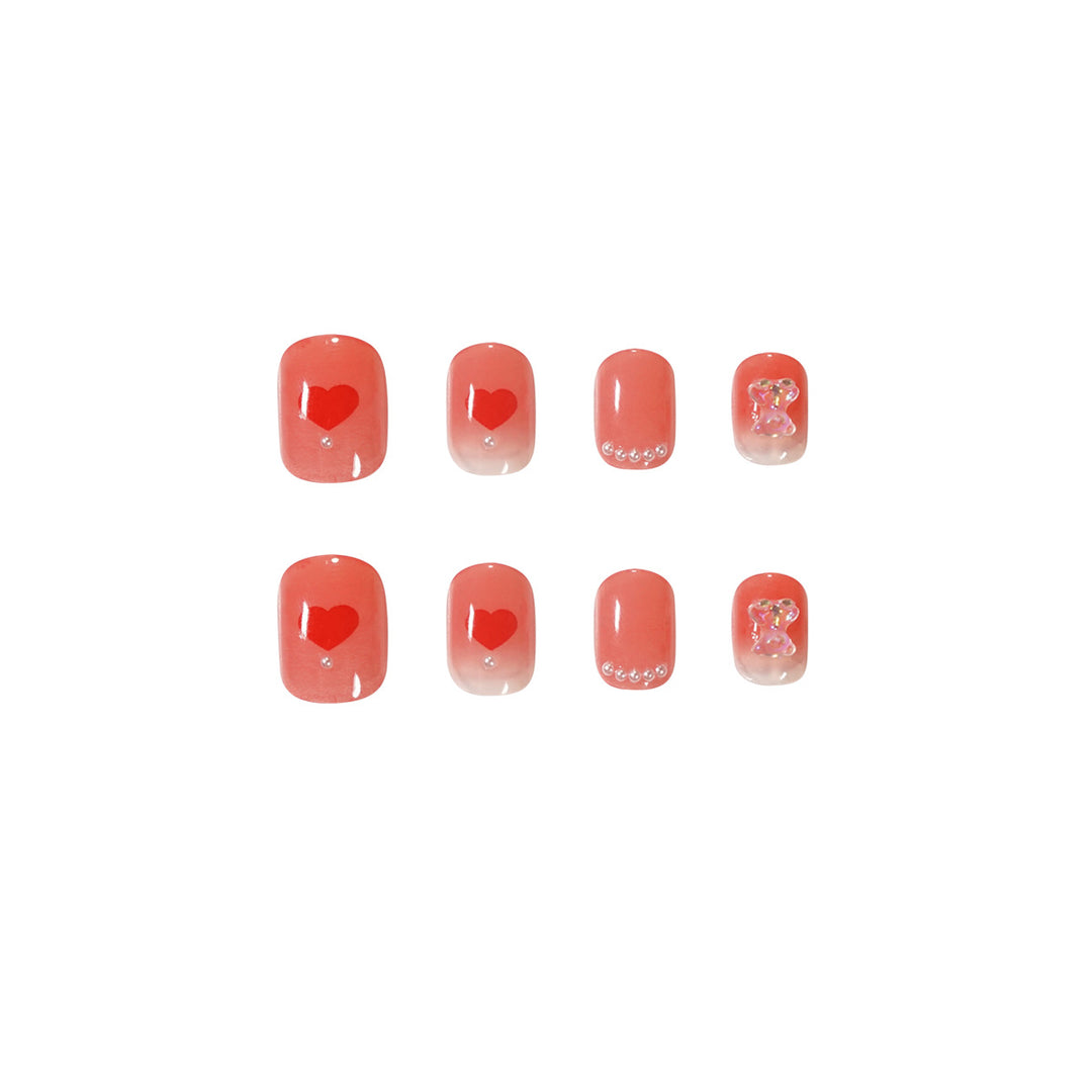 Artful nail art with radiant shine and heart motifs Bowlift