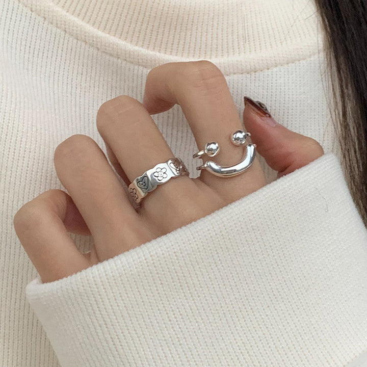 Adjustable Silver Floral Pattern Ring Bowlift