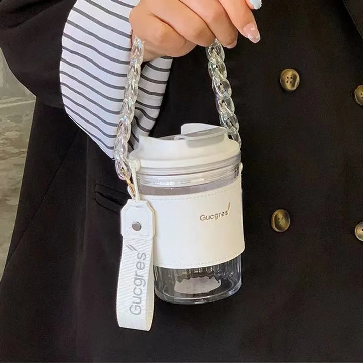 Women's coffee and tea mug with practical carrying handle Bowlift