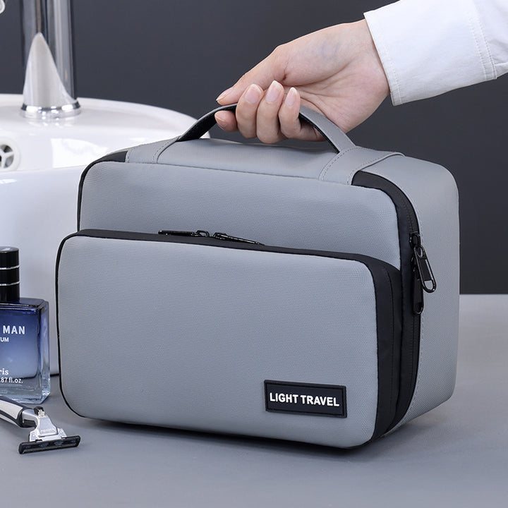 Cosmetic bag with practical organizer and sturdy carrying handle Bowlift