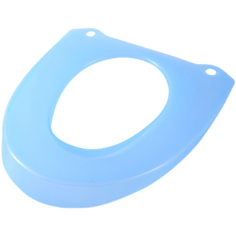 Padded toilet seat reducer with non-slip grips Bowlift