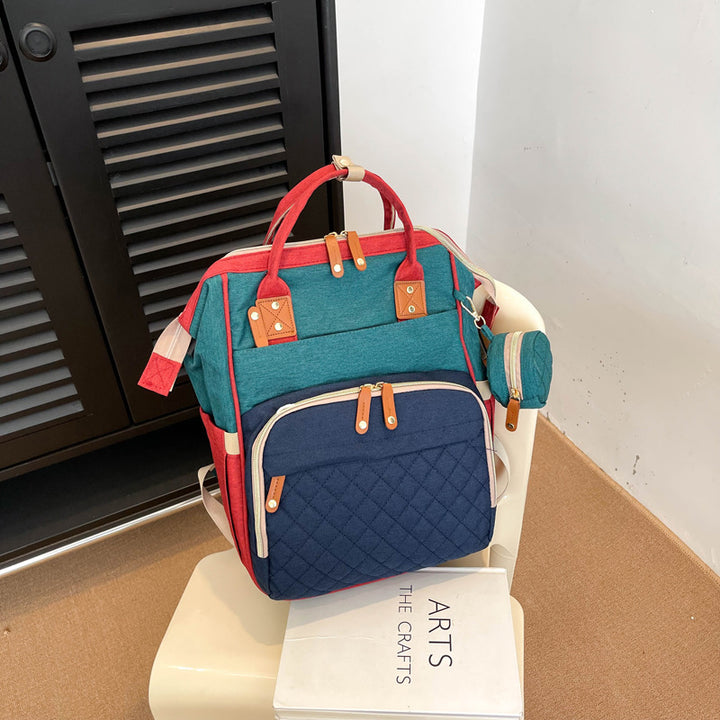 Multi-Pocket Quilted Backpack Bowlift