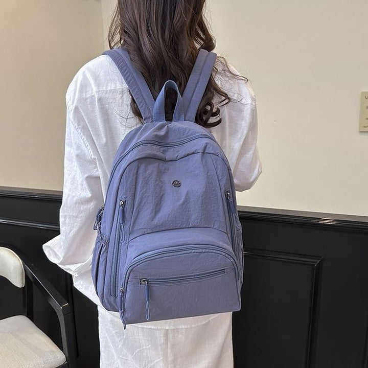 Multi-Compartment Travel Backpack Bowlift