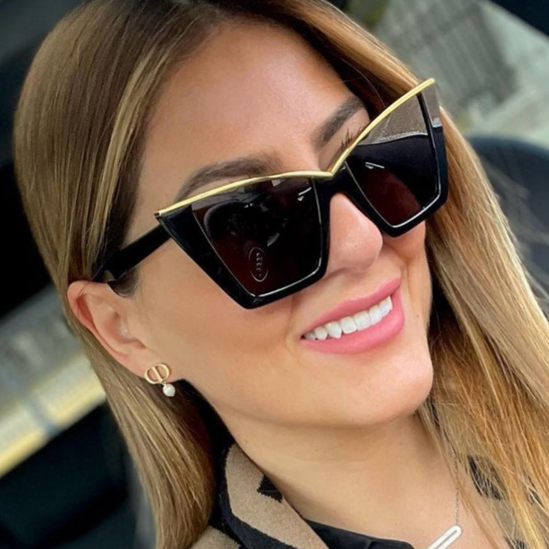 Women extravagant sunglasses with unique design and golden accents Bowlift