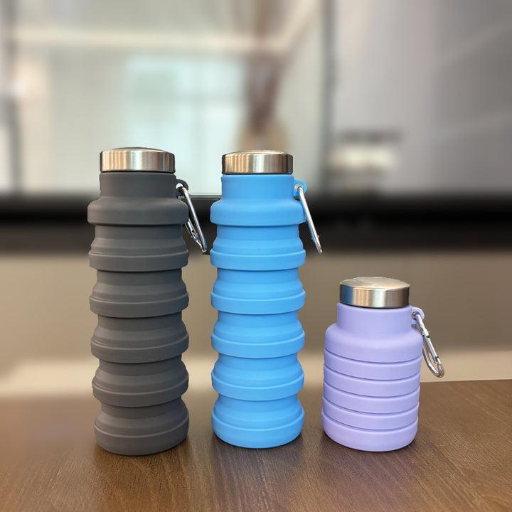 Women practical and compact silicone drinking bottle with carabiner and stainless steel cap Bowlift