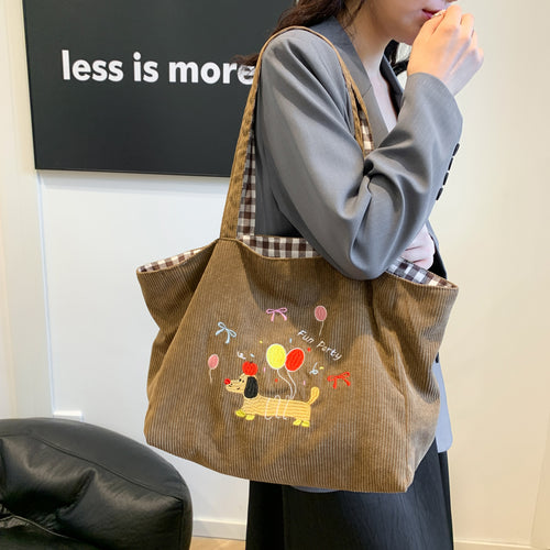 Cotton bag with playful dog motif Bowlift