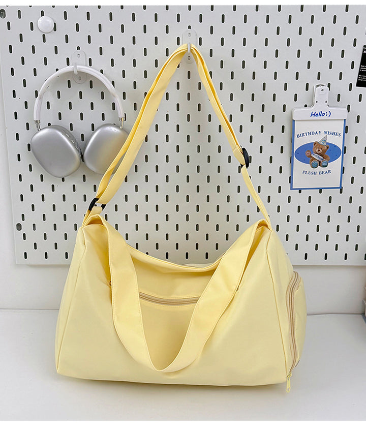 Sporty shoulder bag with spacious interior and sturdy carrying strap Bowlift