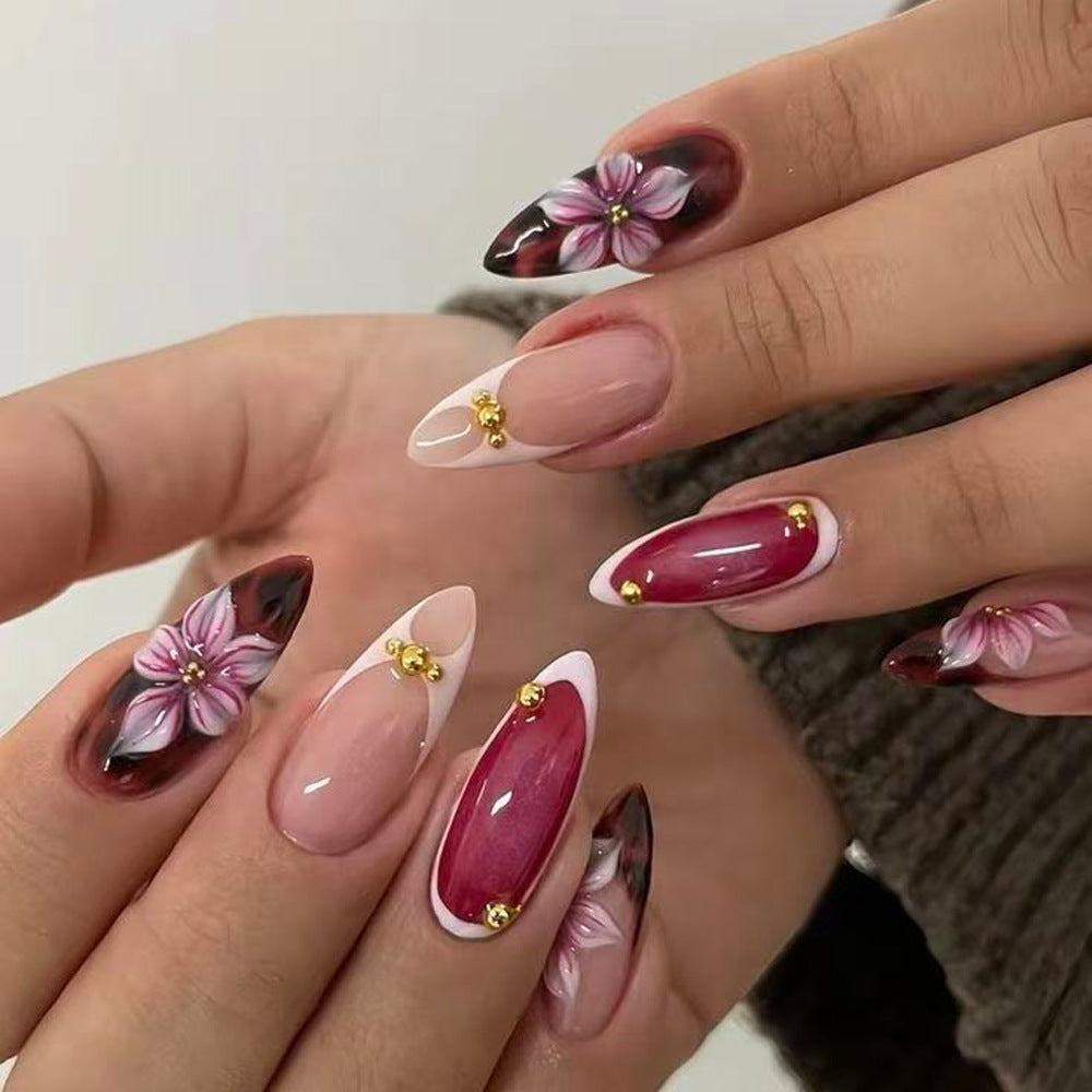 Nail set with elegant floral accents and high gloss finish Bowlift