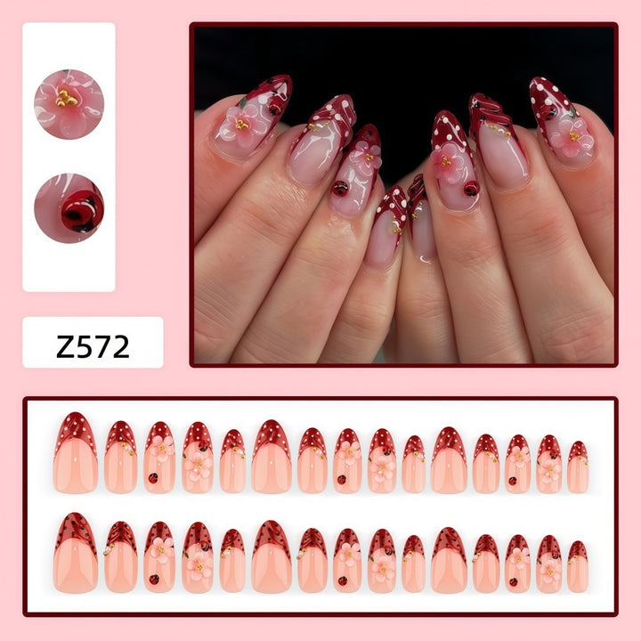 Creative tip design artificial nails with floral accents Bowlift