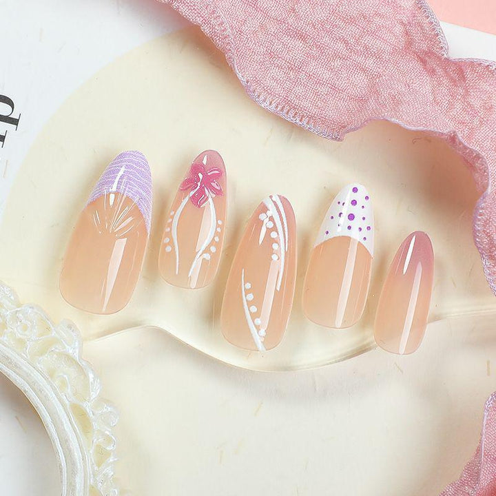 Acrylic nail set with glamorous golden accents Bowlift