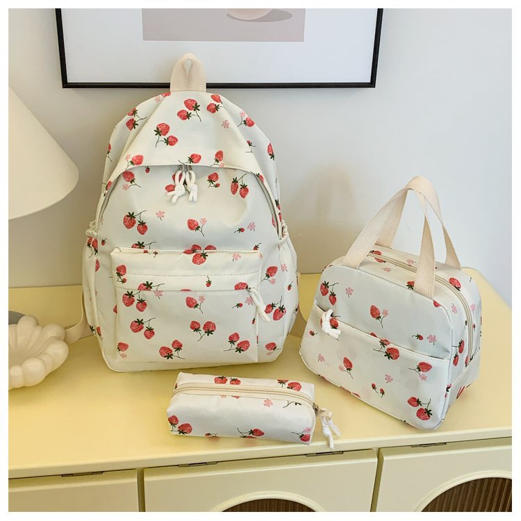 Backpack set with cheerful strawberry pattern and practical compartments Bowlift