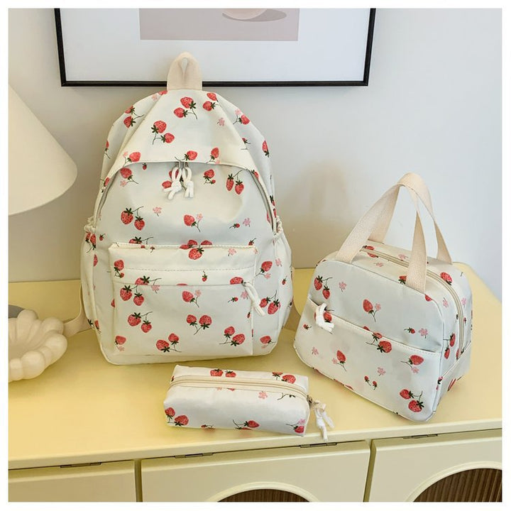 Backpack set with cheerful strawberry pattern and practical compartments Bowlift
