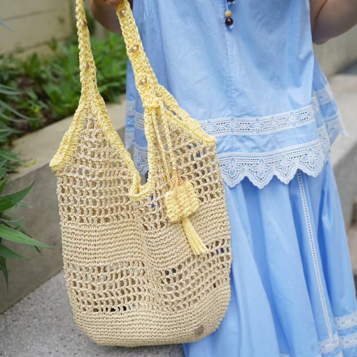 Tote bag made from hand-crocheted yarn with ergonomic shoulder straps Bowlift