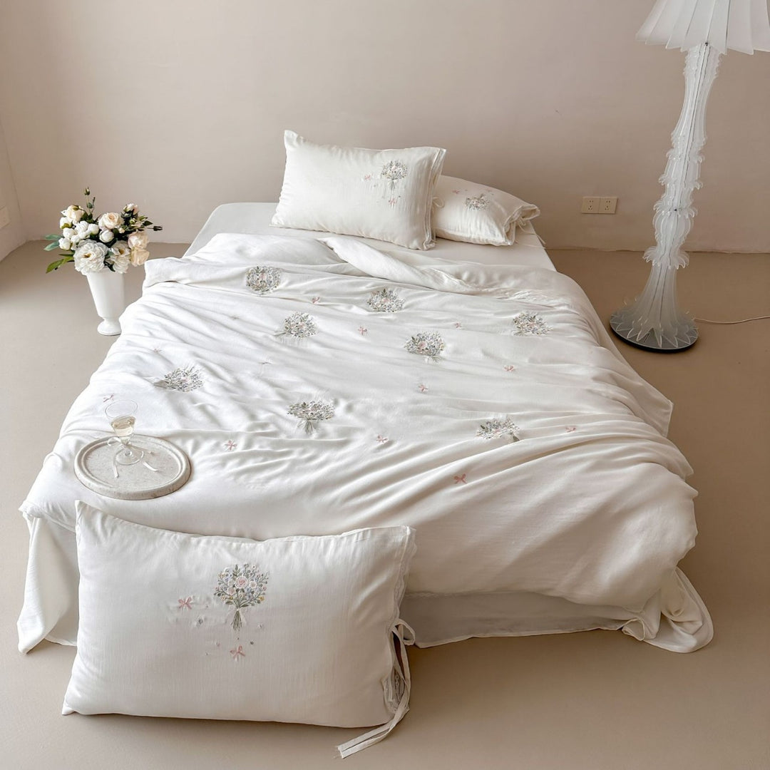 Elegant embroidered cotton satin bedding set with floral bouquet appliqués Bowlift