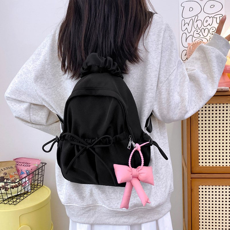 Fashionable backpack with playful details Bowlift