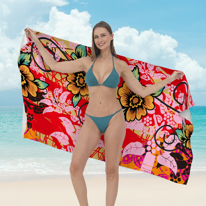 Beach towel with vibrant tropical plant motif Bowlift