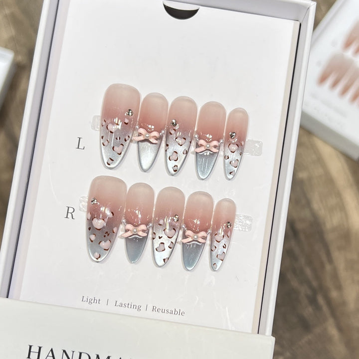 Decorative Press-On Nail Design with Bow Accents Bowlift