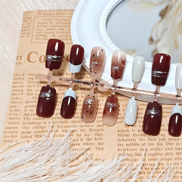Artificial nails with elegant decorative accents Bowlift