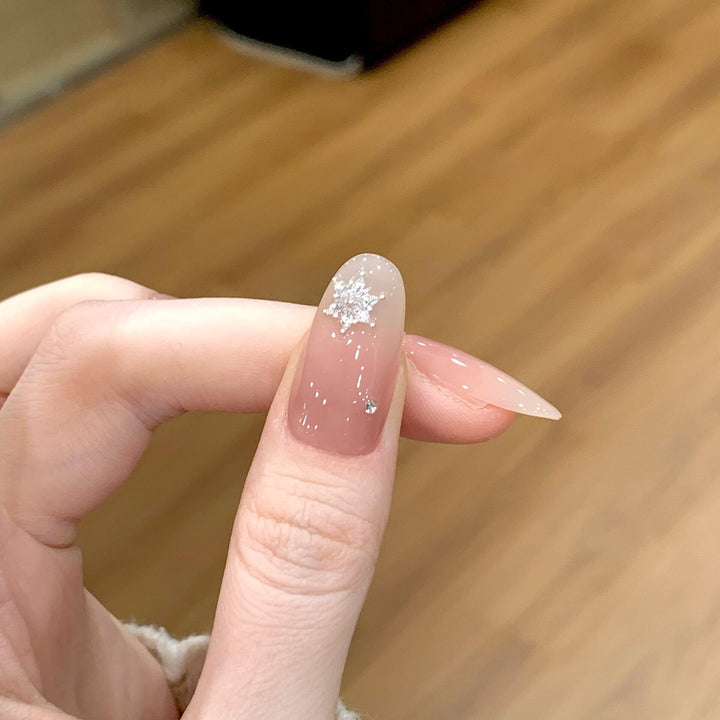 Artificial nails with shimmering effect and elegant star motif Bowlift