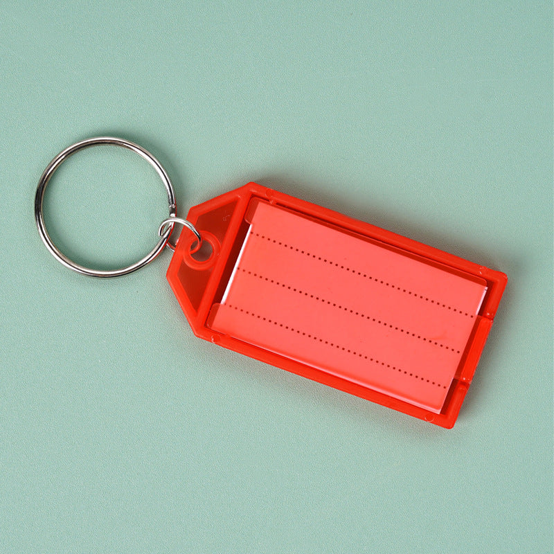 Unisex keychain with reusable label field Bowlift