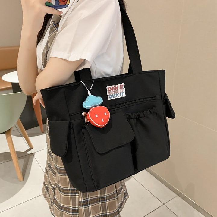 Tote bag with versatile compartments and ergonomic design Bowlift