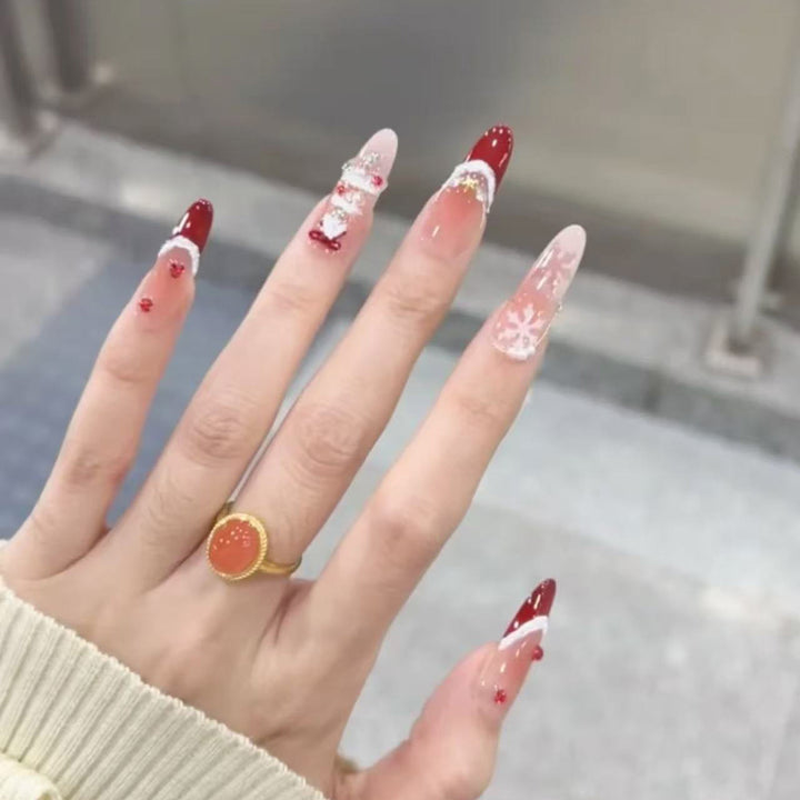 Artificial Christmas art nails with festive design Bowlift