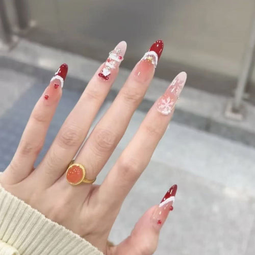 Artificial Christmas art nails with festive design Bowlift